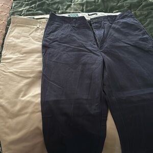 Two pair brand new never been worn Orvis pants khaki and black 35 waist